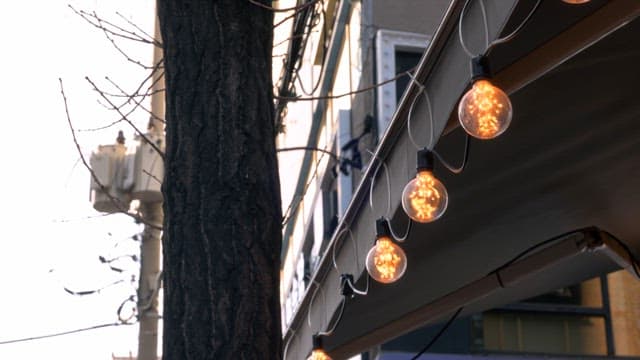 Street lights hanging on a building