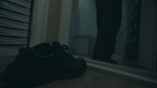 Person Took Off His Shoes in front of the Door and Enters the Room