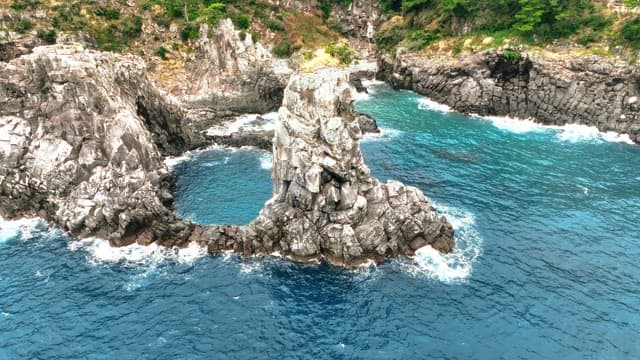 Rocky coastline with clear blue sea