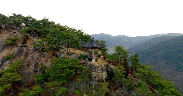 Traditional Pavilion Perched on a Cliffside