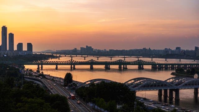 City bridges and skyline at twilight and night