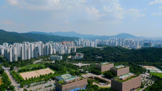 Cityscape with high-rise buildings and greenery