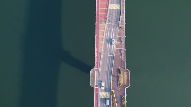 Cars driving on a bridge over water