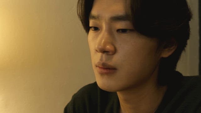 Young man deep in thought