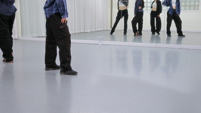 K-POP Dancers Practicing in a Studio