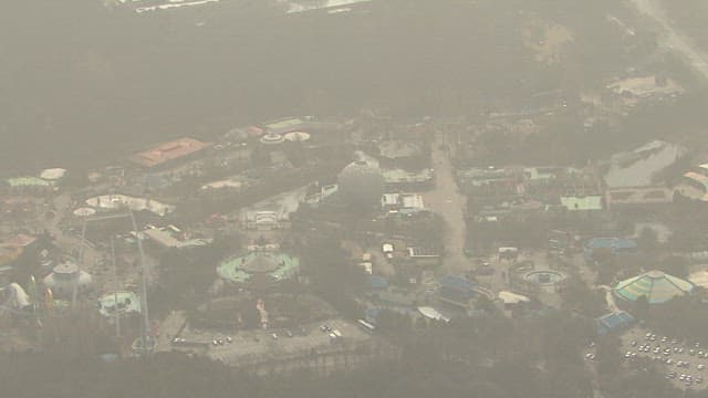 Amusement Park Seen through Haze Fog