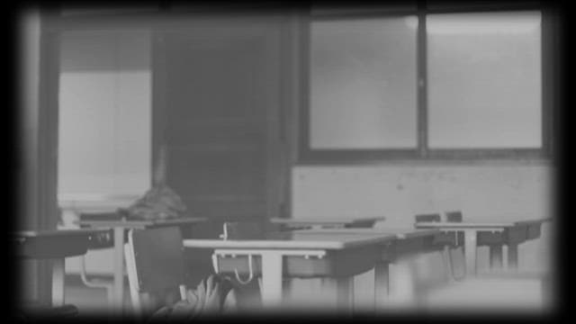 Student Running Through Quiet Classroom and Empty Hallway