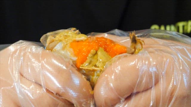 Appetizing soy sauce marinated crab packed with eggs and meat