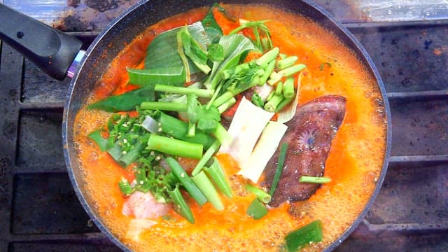 Spicy Fish Soup Cooked on a Pan