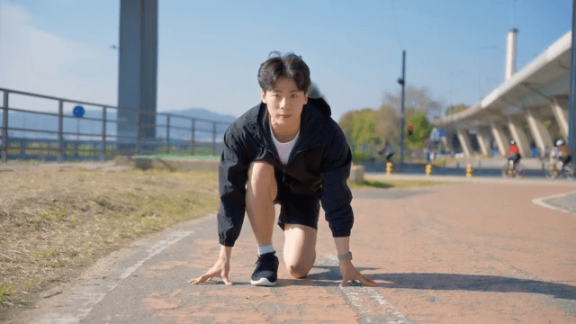 Man preparing to run on a sunny day