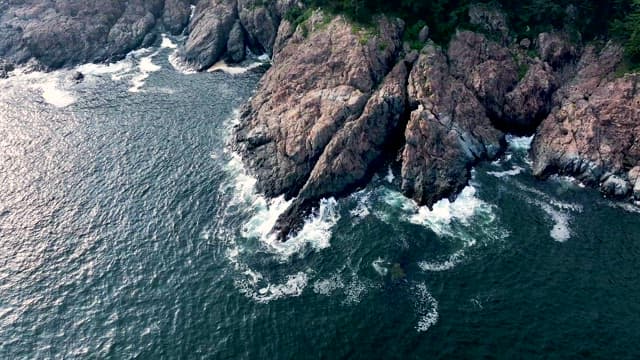 View of Rocky Coastline with Waves