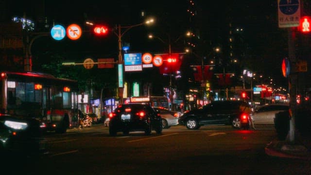 Evening Traffic at Bustling City Intersection