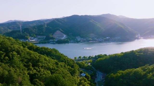 Quiet Lakeside Village Bathed in Strong Midday Sun