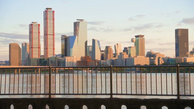 City skyline at sunset with a view of the river