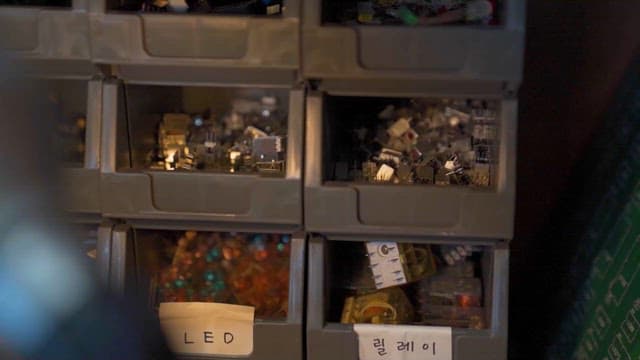 Storage bins filled with electronic components
