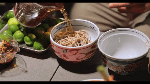 Preparing a traditional noodle dish