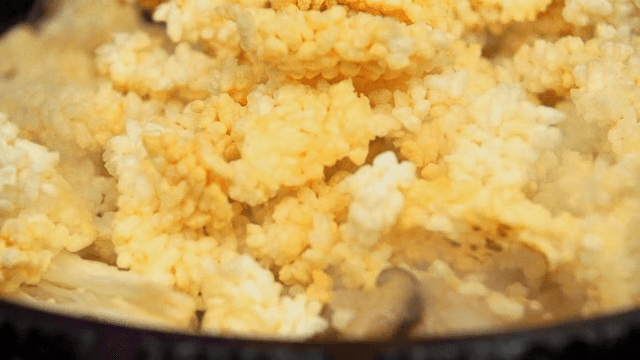 Seafood Scorched Rice Soup Cooked in a Hot Pan