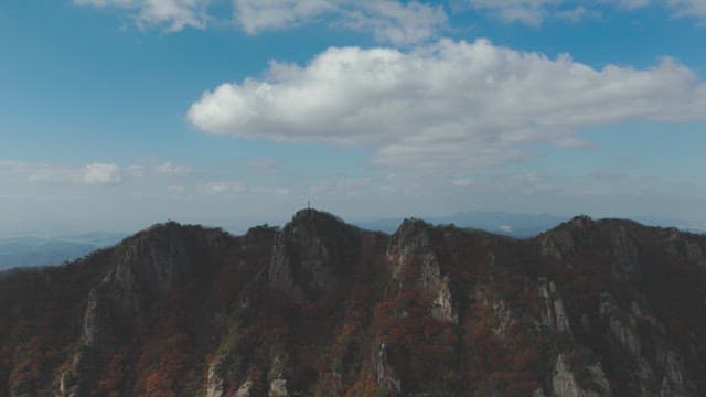 Mountain peaks under a clear blue sky