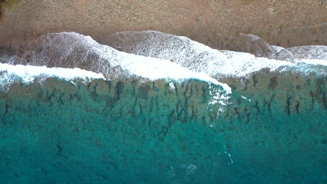 Coast with Emerald Color Waves