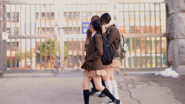 Students leaving school in winter