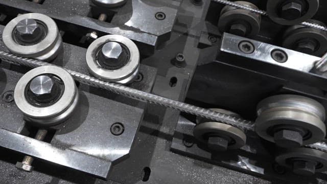 Close-up of a metal processing machine