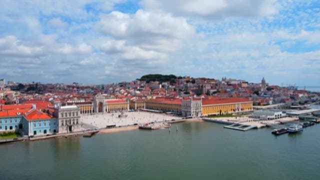 Panoramic View of a City Square by the Waterfront on the Cloudy Day