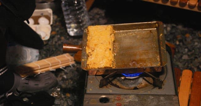 Making Egg Roll on an Outdoor Grill