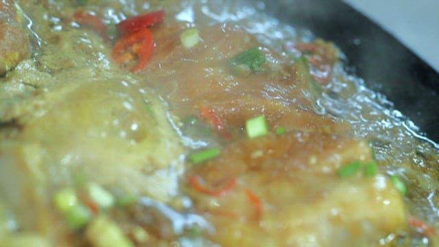 Sizzling Meat on a Hot Pan