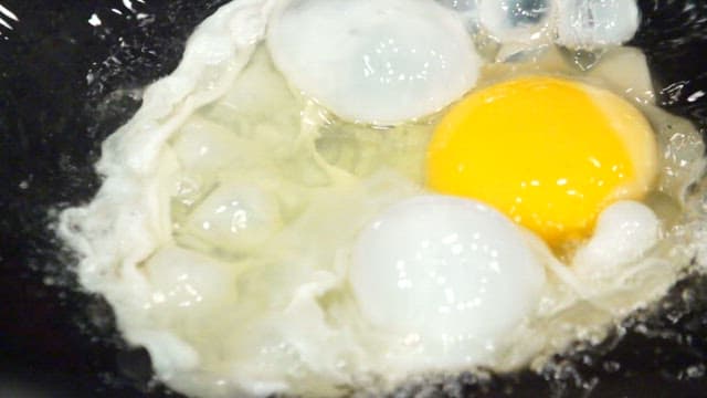 Egg fried in boiling oil