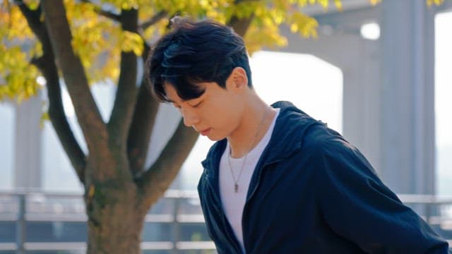 Man skipping rope on a sunny path