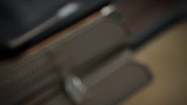 Hand Pressing the Record Button on a Cassette