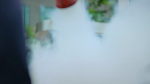 Fire Extinguisher Being Used on a City Street