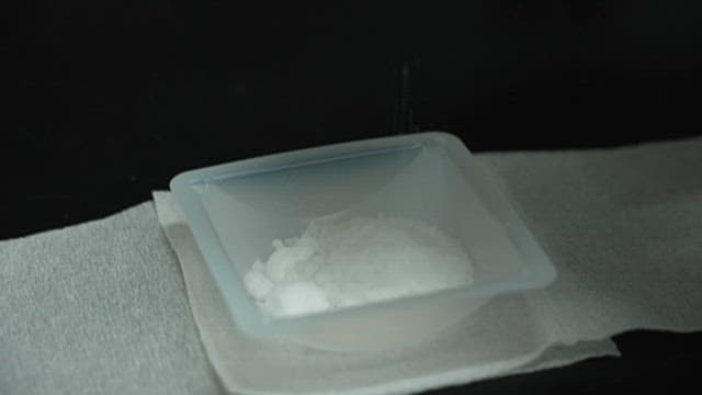 Observing White Powder Potassium Cyanide in a Lab Setting