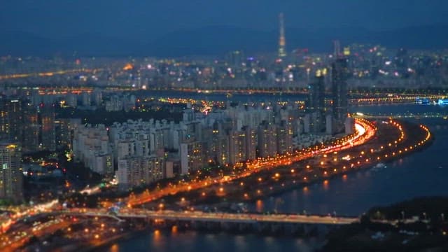 Cityscape at Night with Busy Traffic