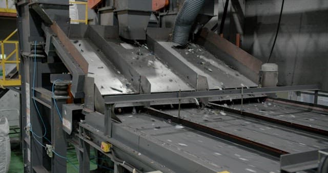 Conveyor System Sorting Materials in a Facility