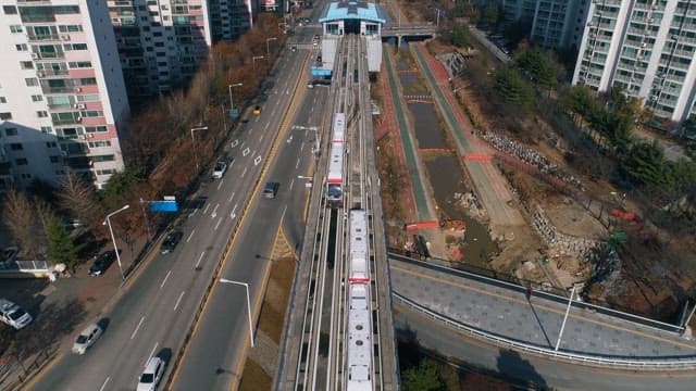 Subway Running Through the Middle of the City and Station