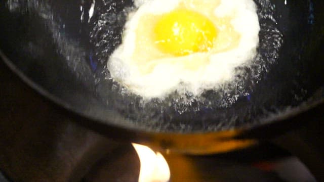 Egg fried in boiling oil