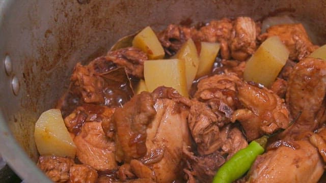 Chicken abodo with potatoes and peppers
