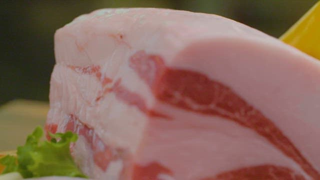 Fresh pork belly on a cutting board