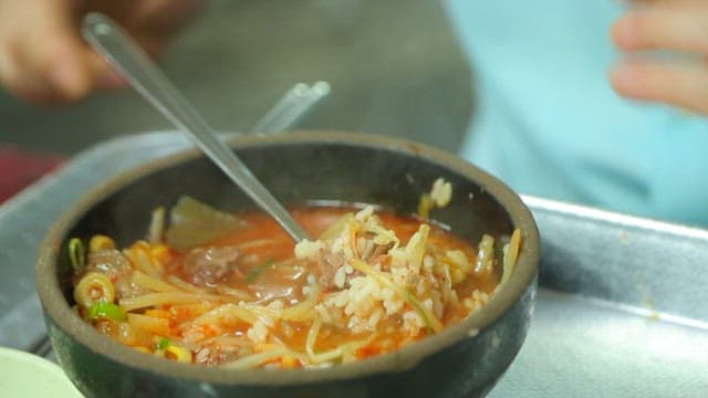 Beef soup with diced radish kimchi