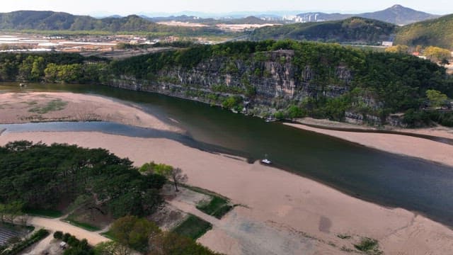 Scenic river with surrounding cliffs