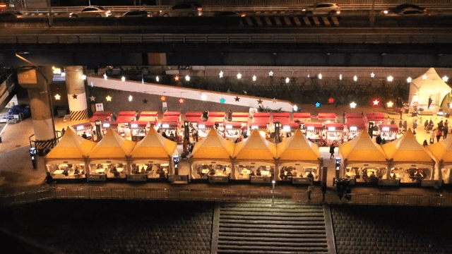 Night Market Bustling with Activity Overhead View