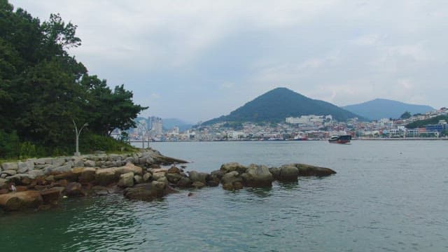 Coastal city with mountains and sea
