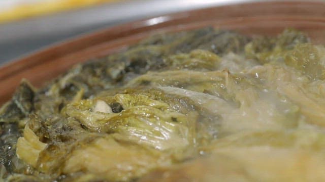 Korean style fermented kimchi stew boiling in a pot
