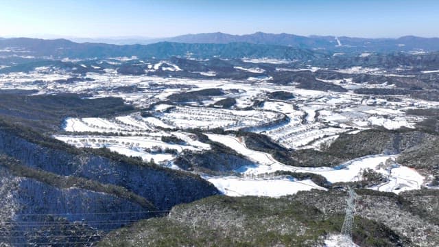Snowy Landscape with Winding River