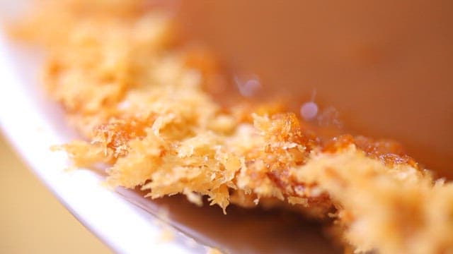 Pork cutlet with sauce on a plate