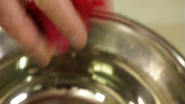 Rose Petals Floating in Water in a Bowl