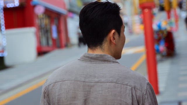 Angry man quarreling on a busy street