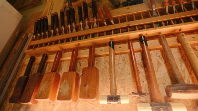 Various Woodworking Tools Mounted on Wall