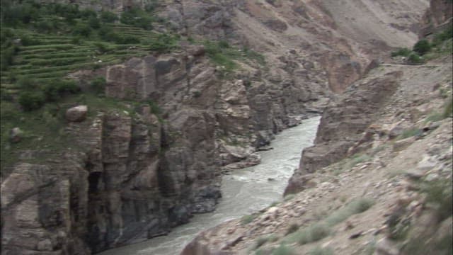 River Flows Through a Rocky Mountain Landscape